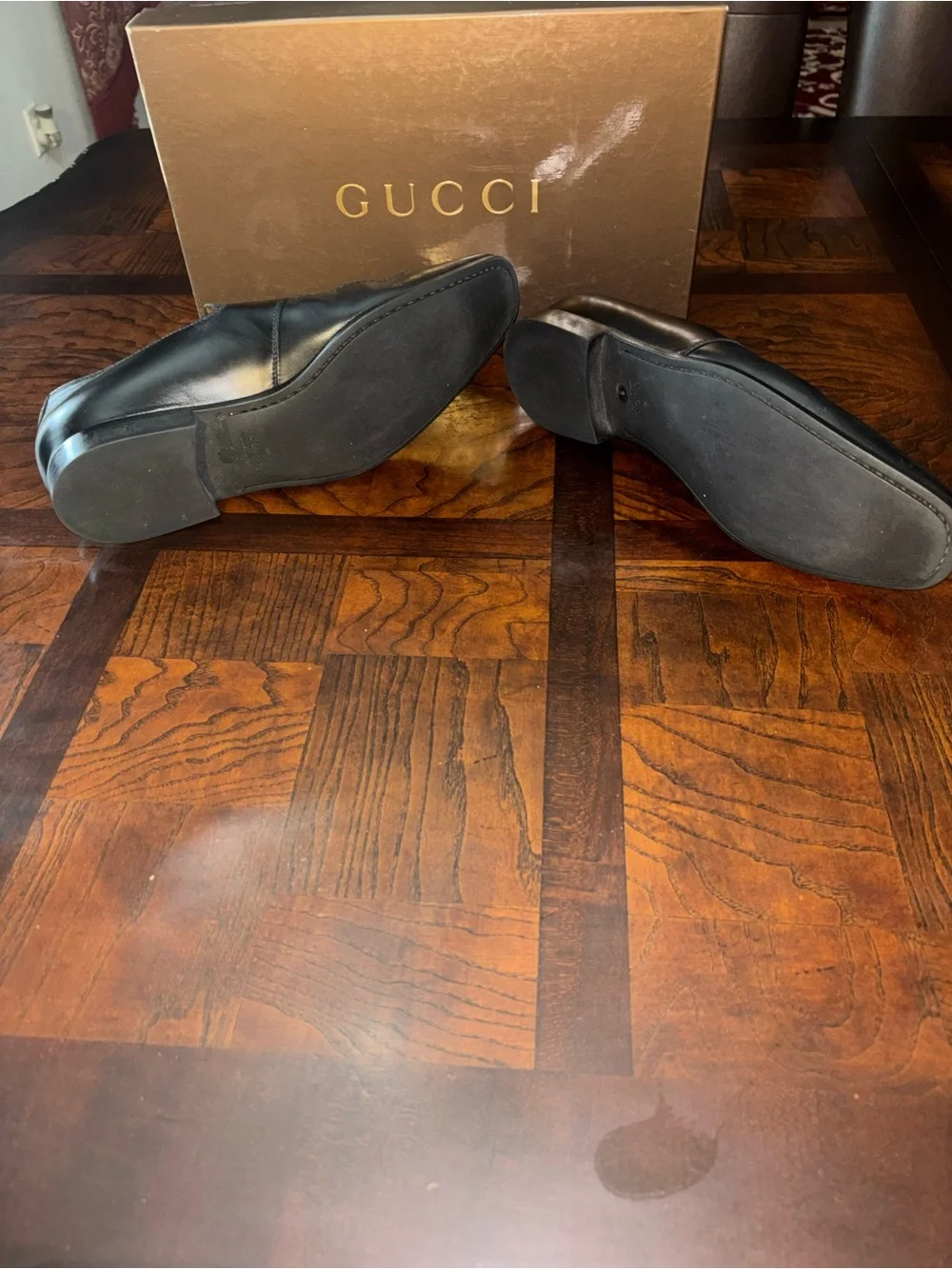 Gucci Black Embossed GG Leather Slip-Ons